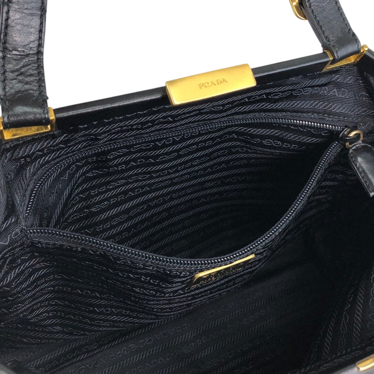 PRADA Logo Embossed Metal Clasp Handbag Black Vintage x7p3fx