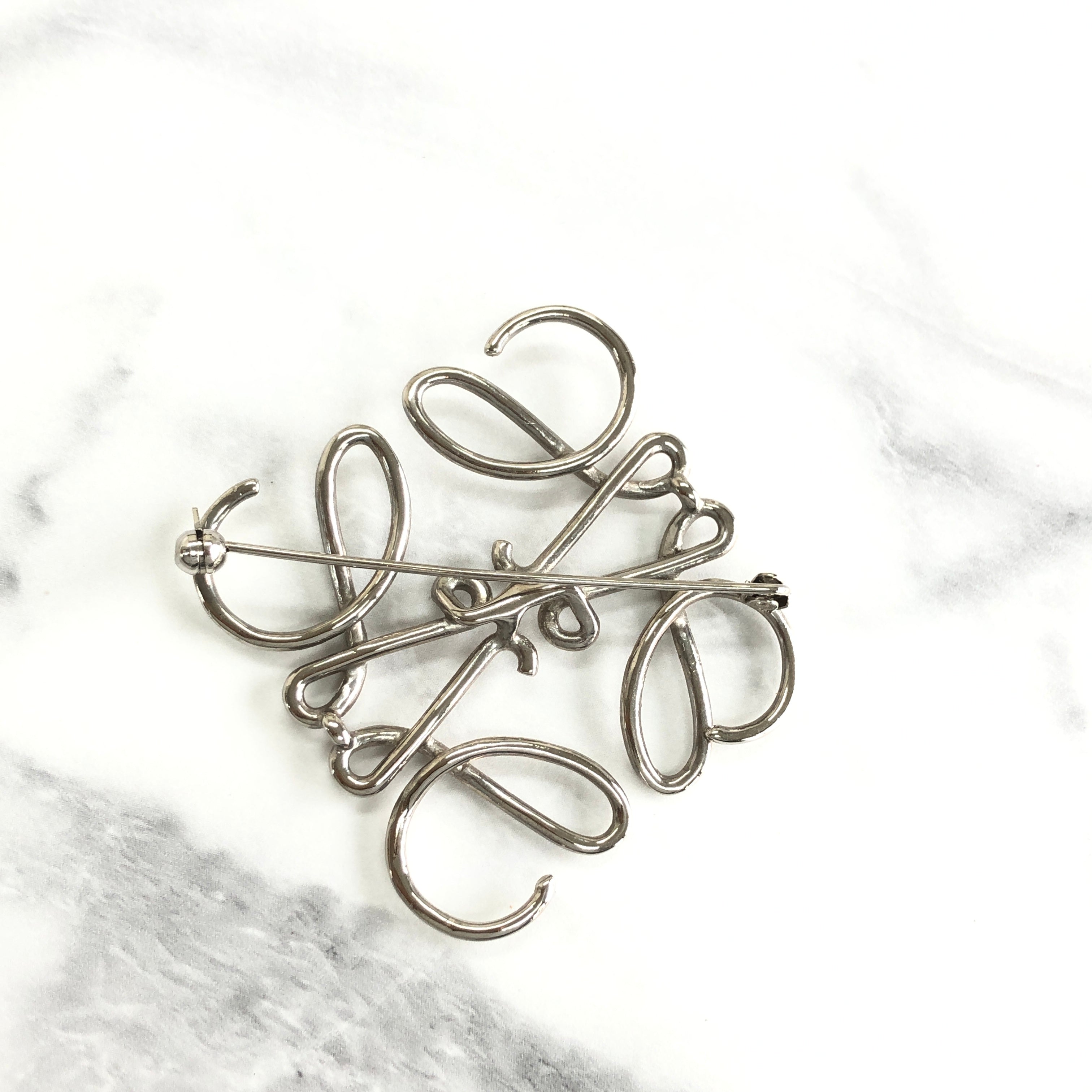 Loewe on sale brooch silver