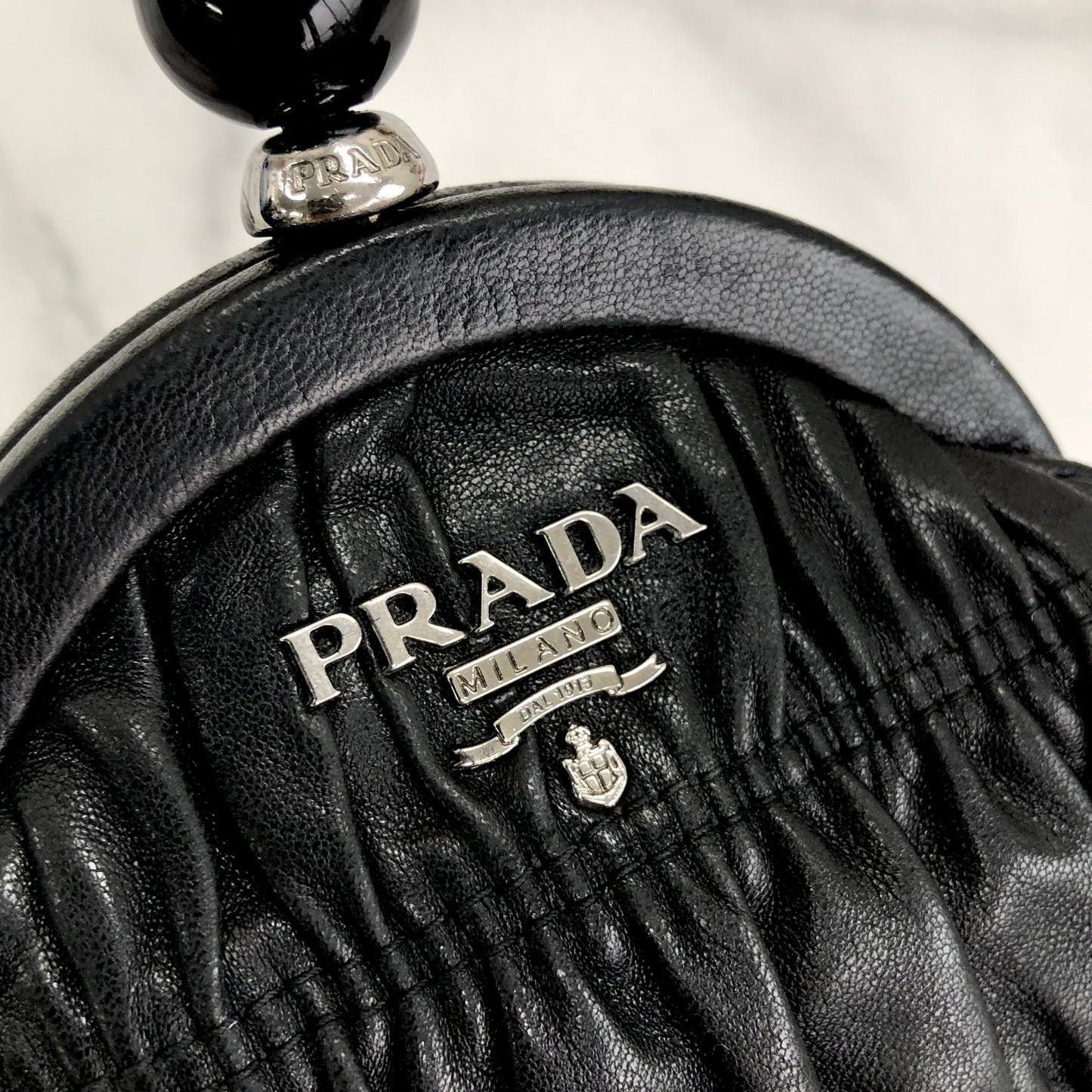 PRADA Clasp Coin purse stone gather leather black rbxcjb