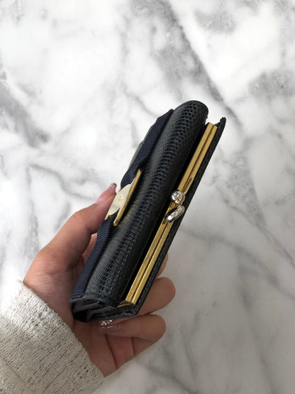 Salvatore Ferragamo Vala 絲帶皮革金屬扣折疊錢包黑色復古 2hapn4 