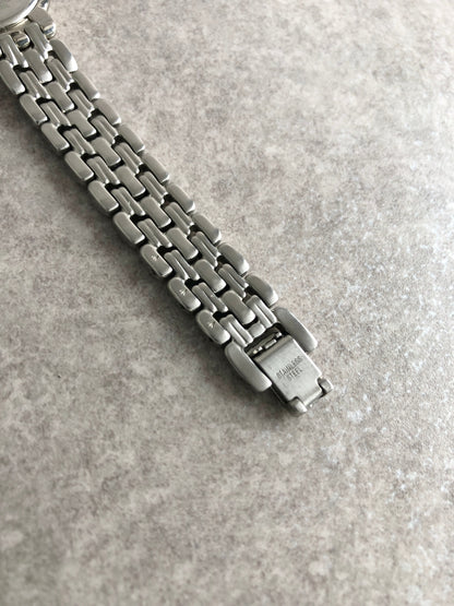 Yves Saint Laurent YSL Logo Quartz Watch Silver Vintage h6kph8