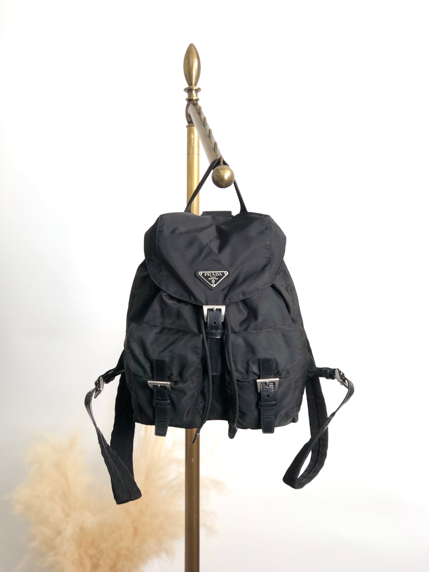 PRADA 三角形標誌雙口袋背包黑色復古 482mjk