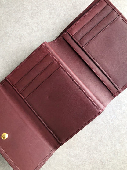 Yves Saint Laurent Logo Embossed Metal Clasp Trifold Wallet Bordeaux Vintage 4jw545