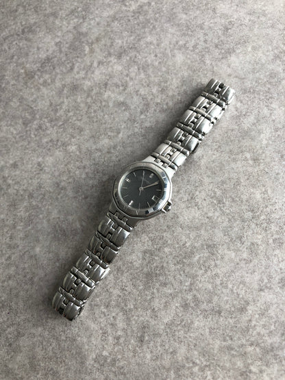 Yves Saint Laurent Logo Quartz Watch Silver 9613-H22714 Vintage w3ynyr
