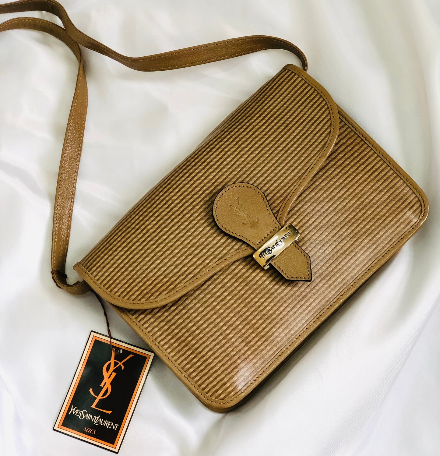 Yves Saint Laurent YSL embossed front lock PVC leather pochette shoulder bag beige vintage old xcm5c4