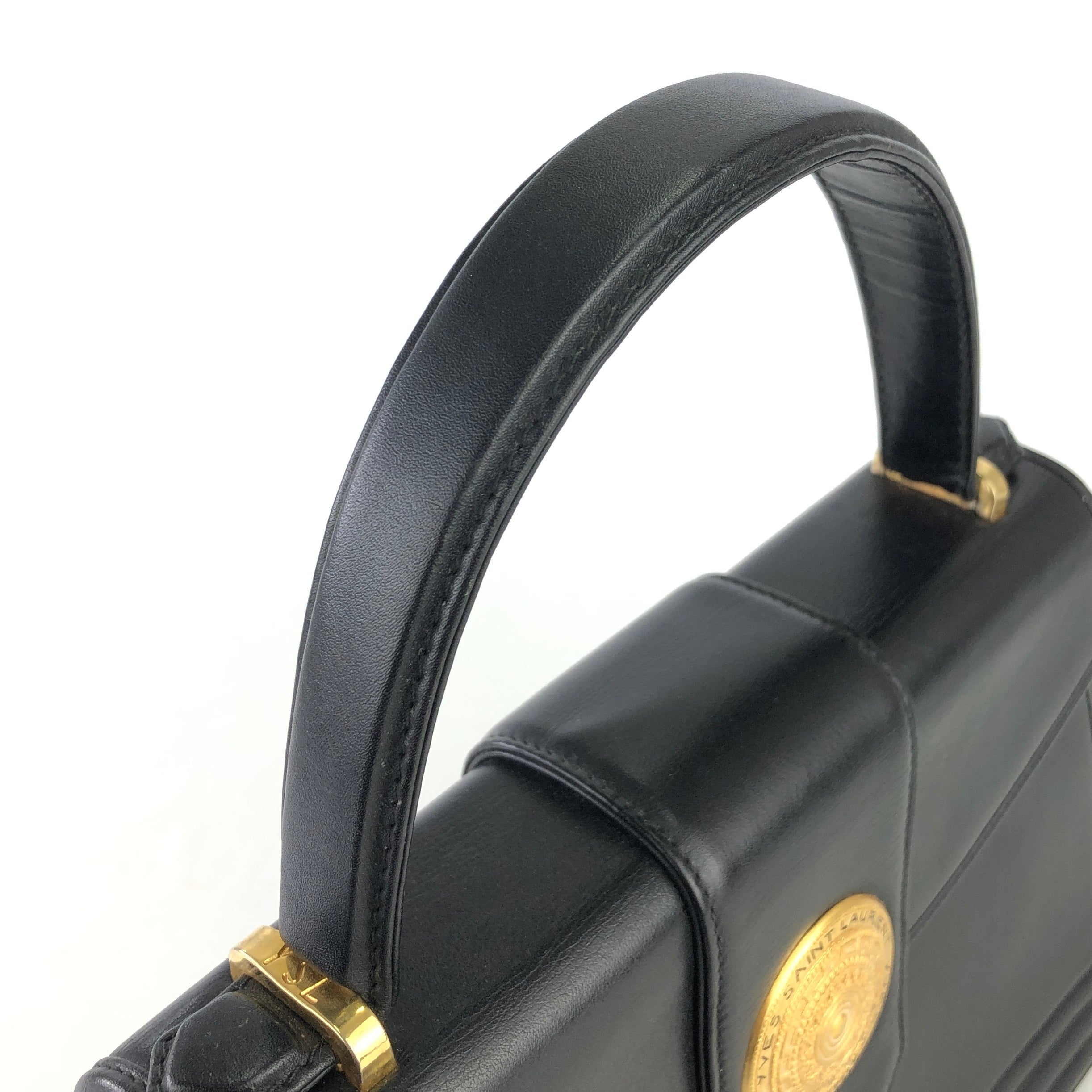 Yves Saint Laurent medal motif leather kelly type handbag black vintag –  VintageShop solo