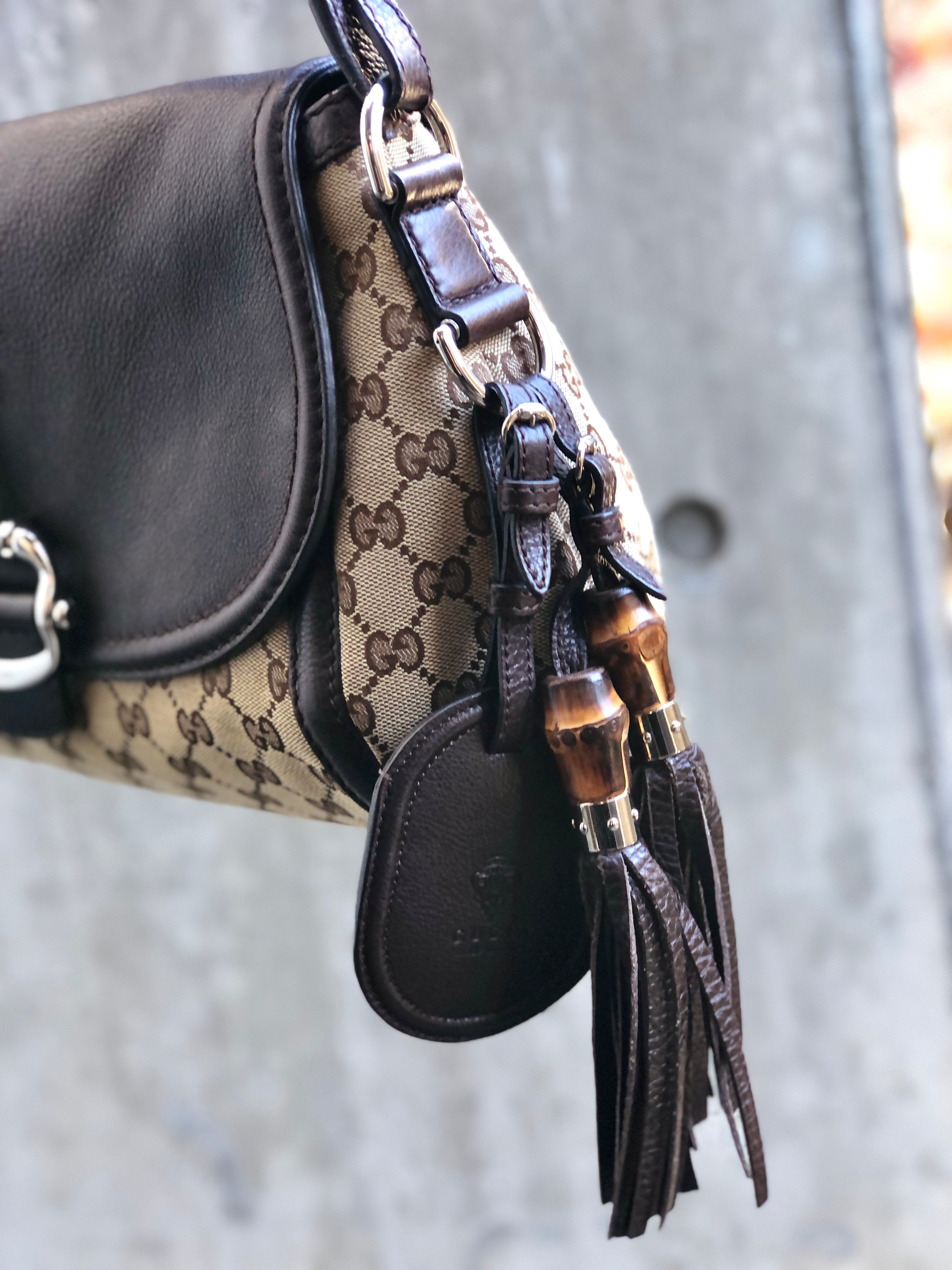 Gucci purse with tassel sale