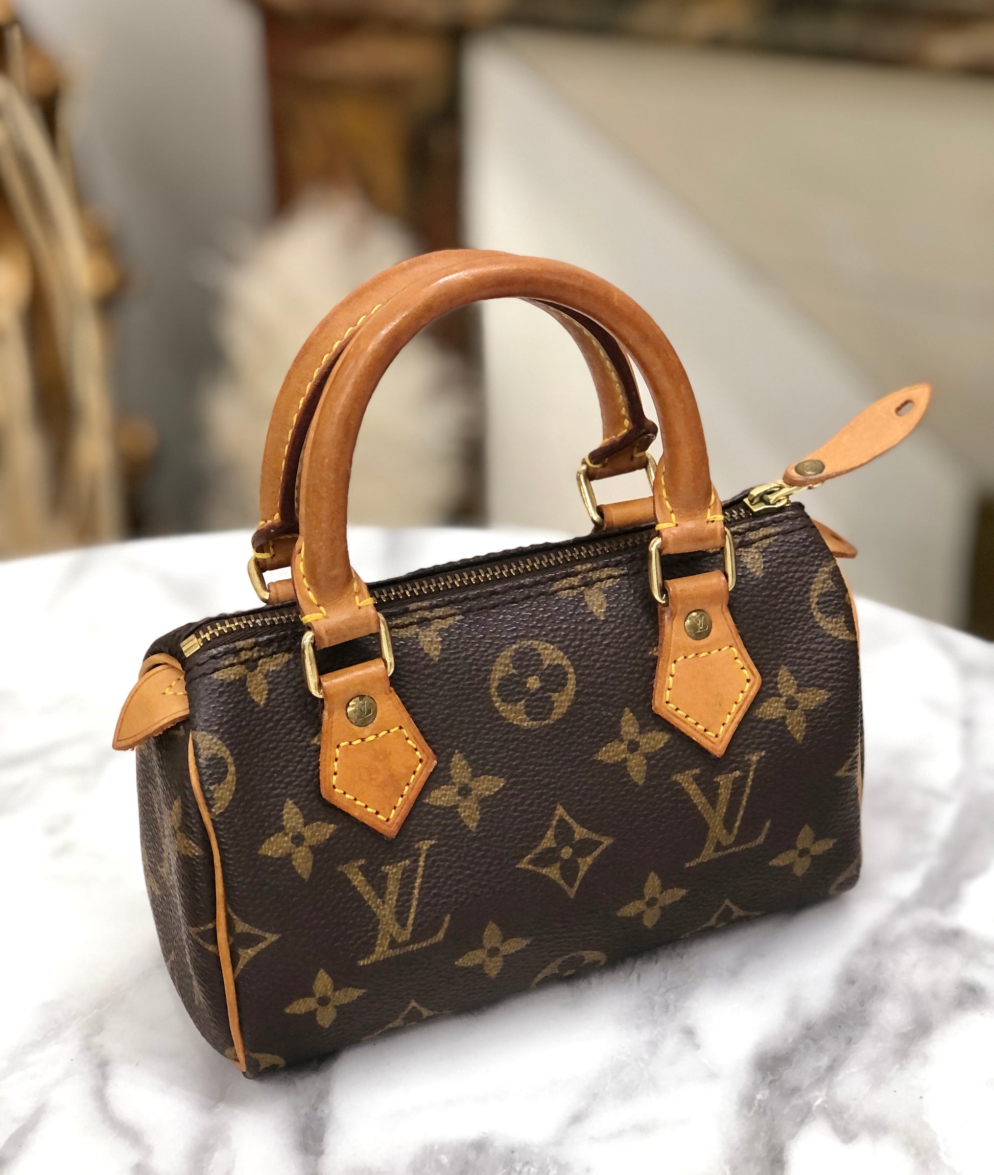 Louis Vuitton vintage small handbag with leather strap