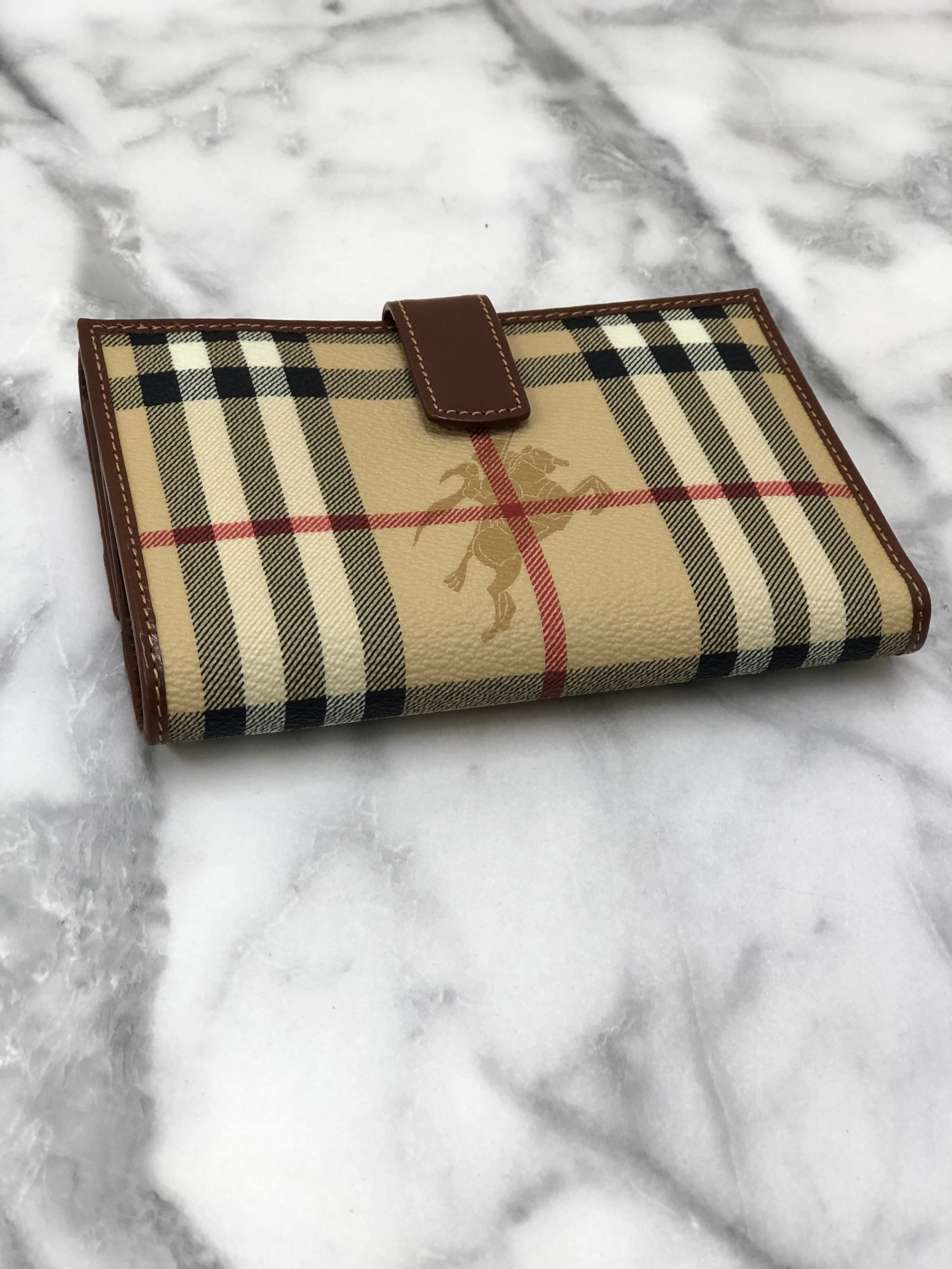 Burberry nova store check wristlet